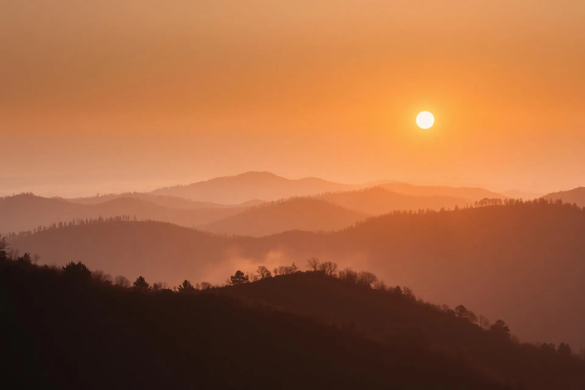 Sunrise over peaceful mountain ridges